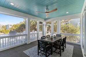 Outdoor dining - Zephyr's Muse: New, Luxurious 6BR Home in Oak Island w/ Ocean Views, Pool, Hot Tub, and Elevator (Oak Island)