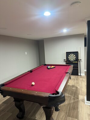 Game room - Ted’s Place. Luxury 5-bedroom house in Rockingham. Premium Home. Rare find. (Rockingham)
