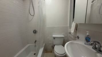 Hair dryer, towels, soap, shampoo