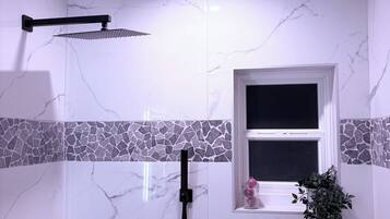 Shower, hair dryer, towels, soap