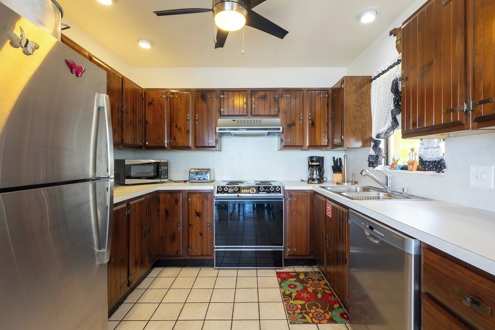 Fridge, stovetop, coffee/tea maker, cookware/dishes/utensils