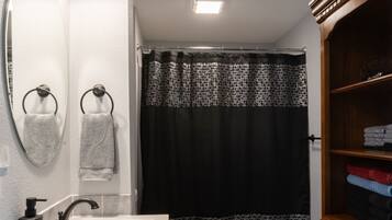 Hair dryer, towels, soap, toilet paper