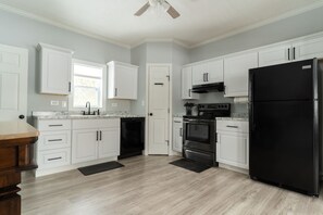 Microwave, oven, stovetop, dishwasher - Newly Renovated 4BR Home in the Heart of Hays – Walk to Dining & Downtown (Hays)