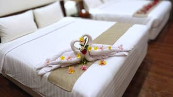 Family Suite, City View | In-room safe, desk, blackout drapes, iron/ironing board