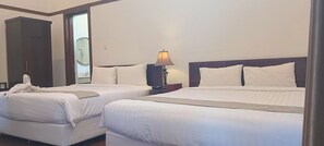 Family Suite, City View | In-room safe, desk, blackout drapes, iron/ironing board - HOTEL BUTIK SAWUNGGALING (Bandung)