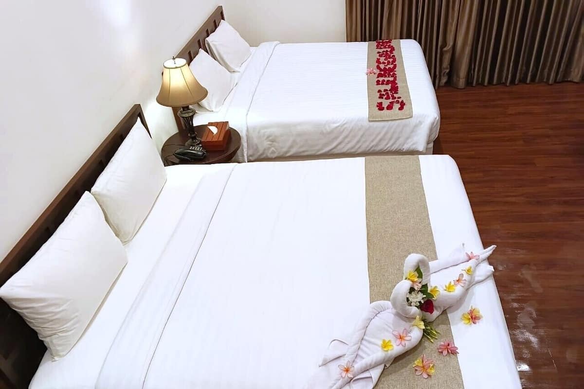 Family Suite, City View | In-room safe, desk, blackout drapes, iron/ironing board