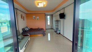 Habitació quàdruple, vistes parcials al mar | Wifi gratuïta 