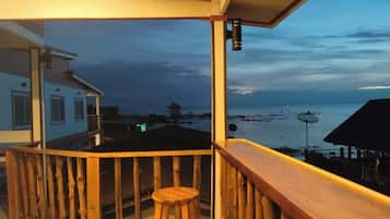 Quadruple Room, Partial Sea View | Beach/ocean view