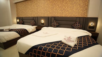 Een minibar, gratis wifi, beddengoed