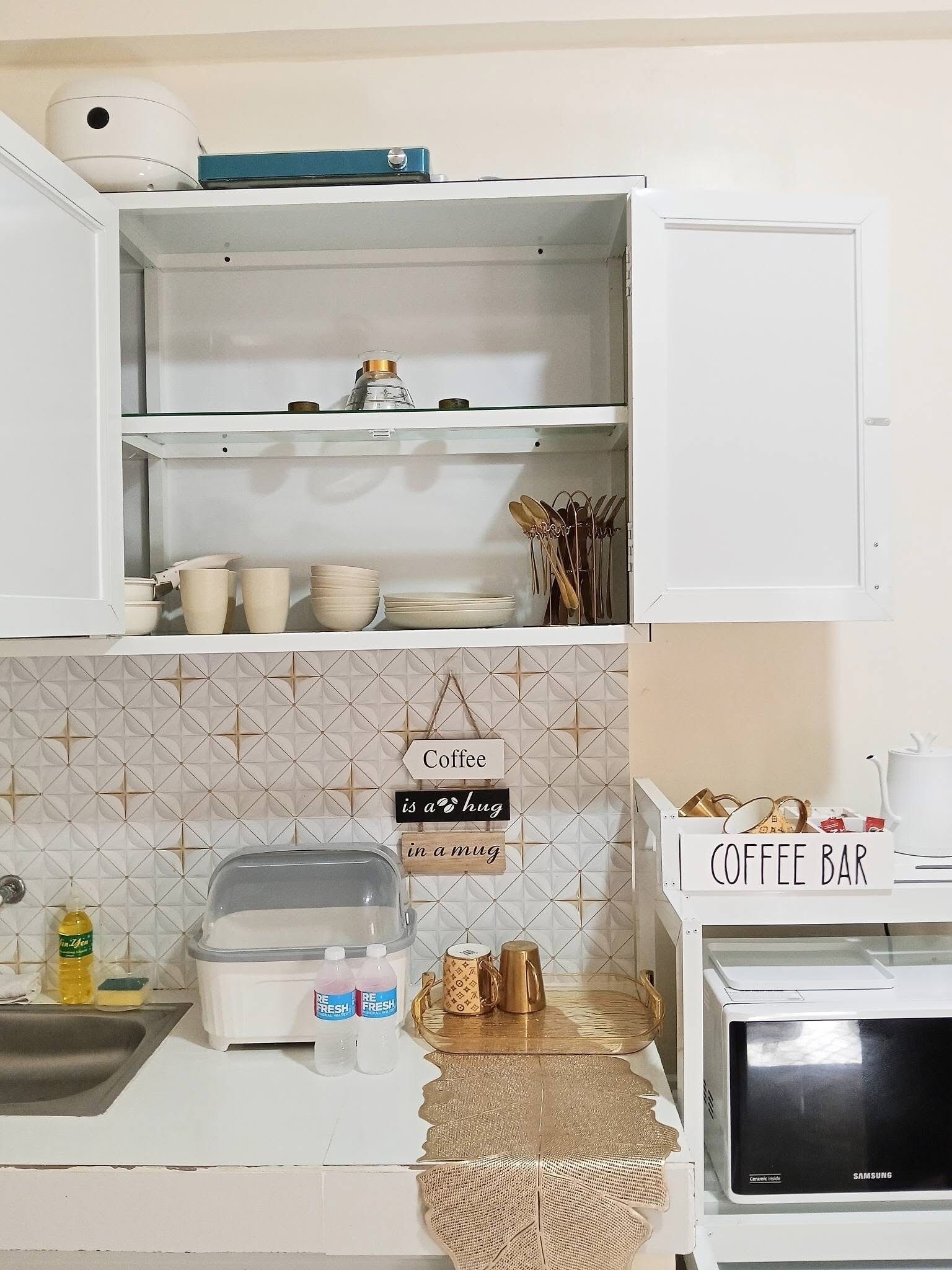 Fridge, microwave, stovetop, coffee/tea maker