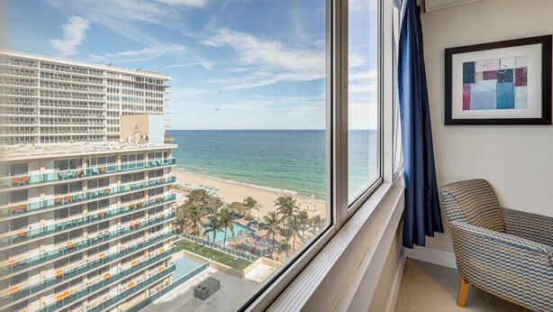 A high-rise hotel room with a view of a beach and ocean. - Steps to Sand! 10th-Floor Ocean Manor Unit w/ Pool (Fort Lauderdale)