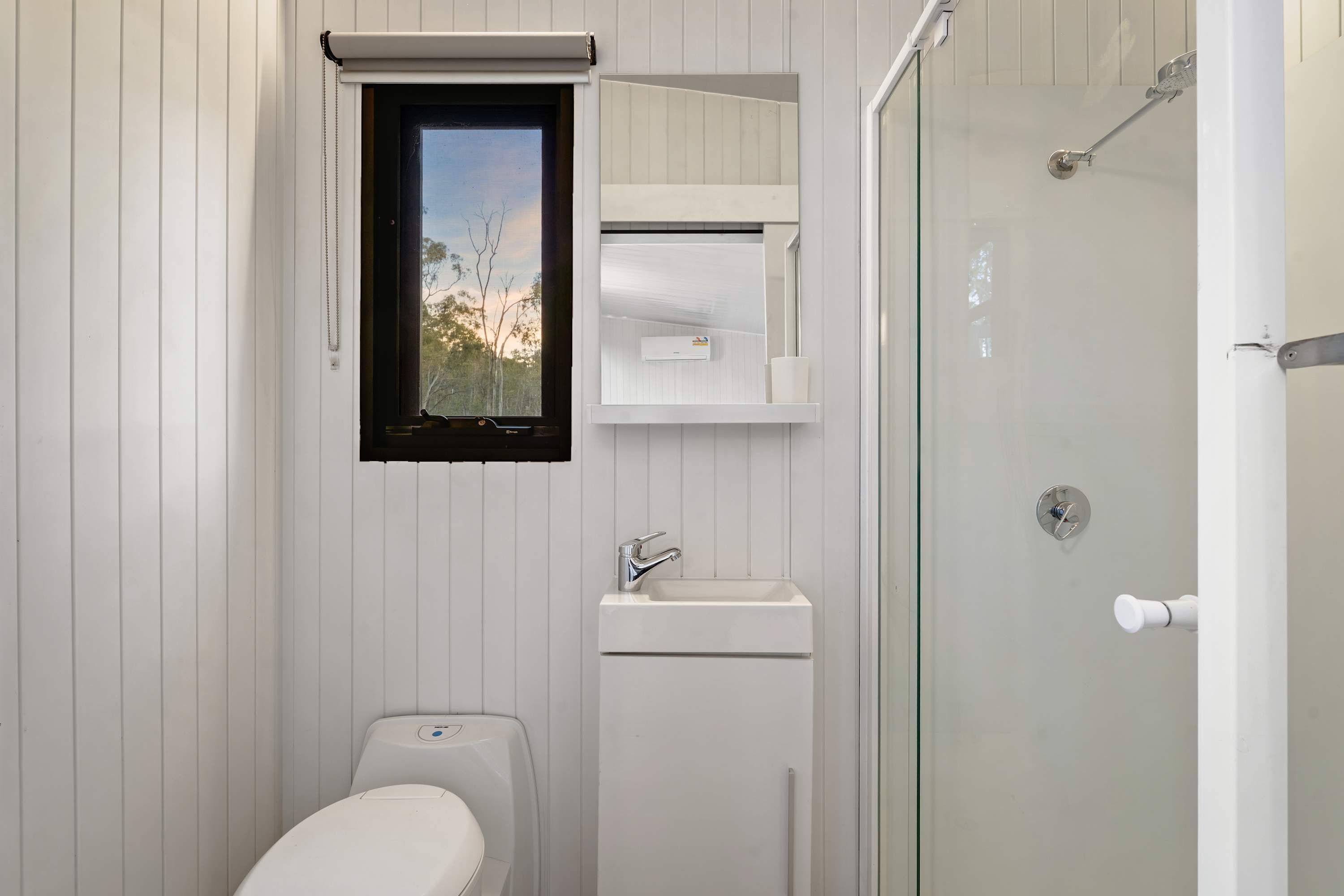 Shower, hair dryer, towels, shampoo