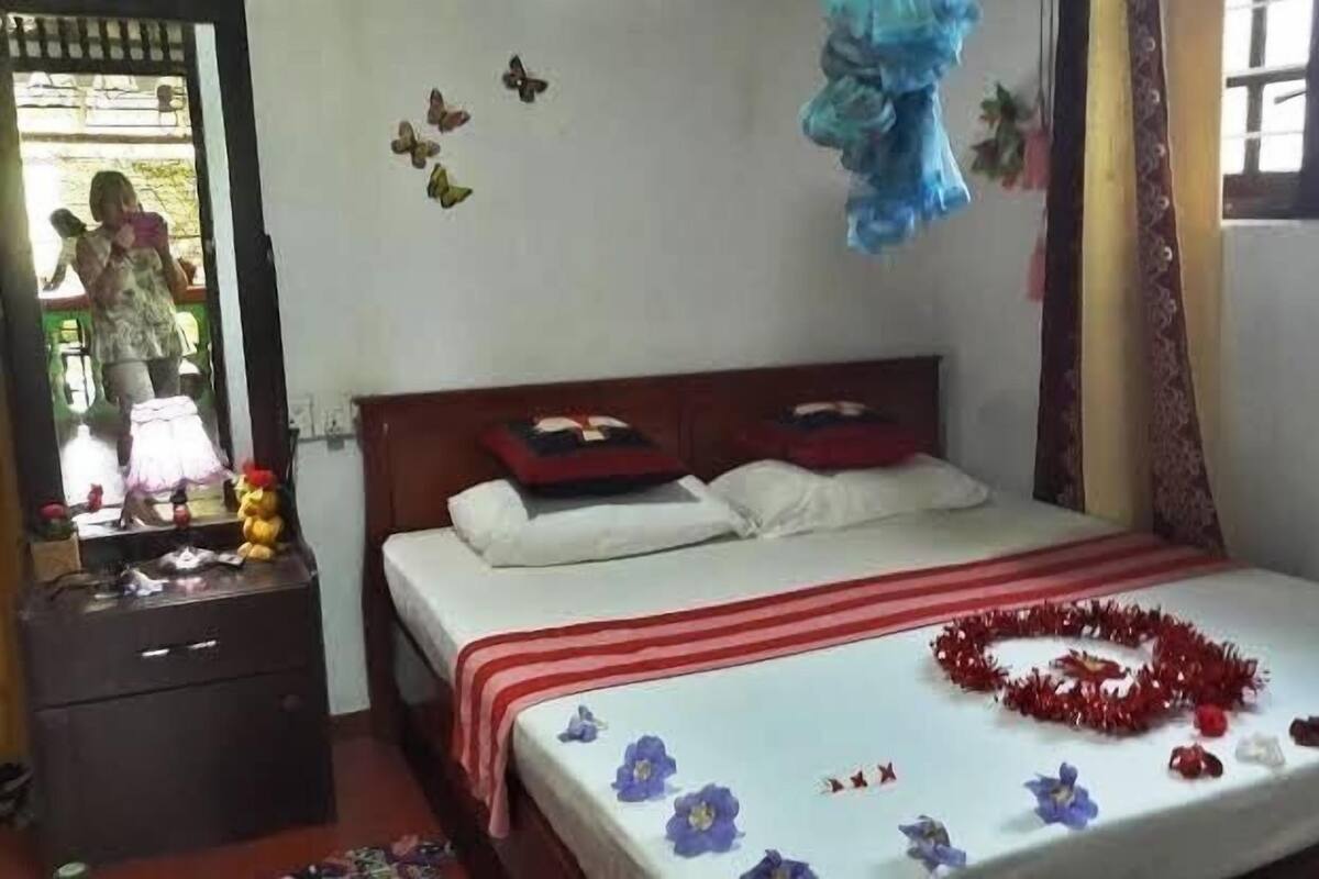 Economy Double Room | Down comforters, Select Comfort beds, desk, laptop workspace