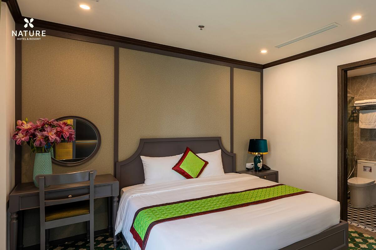 Habitación Deluxe con 1 cama doble o 2 individuales | Ropa de cama hipoalergénica y minibar (con algunos artículos gratuitos)