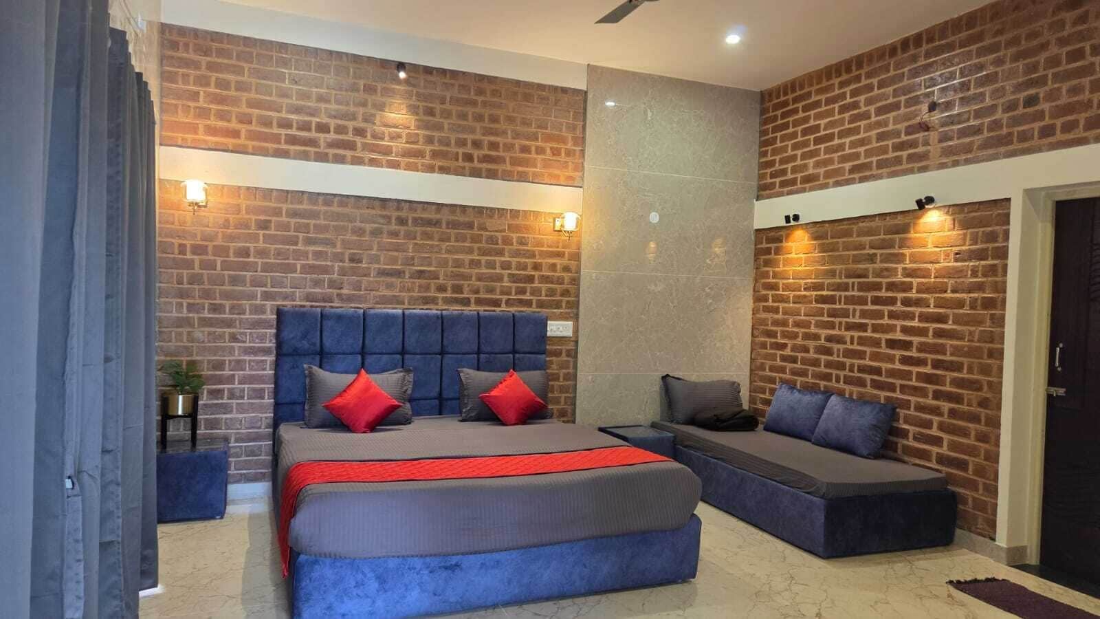 デラックス トリプルルーム ガーデンビュー | 遮光カーテン、アイロン / アイロン台、WiFi (無料)、ベッドシーツ