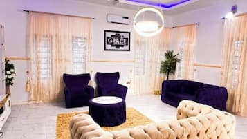 Family Apartment, Balcony, City View | Living area