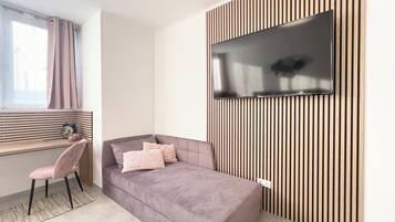 Habitación básica | Tabla de planchar con plancha y wifi gratis