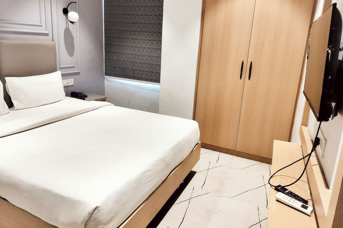 Executive kamer, 1 twee- of 2 eenpersoonsbedden | Een bureau, een laptopwerkplek, gratis wifi