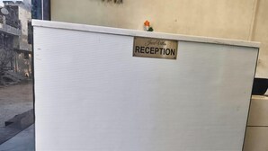 A reception area with a sign that reads "Jazz Villas RECEPTION". - Hotel Jazz Villas (Agra)