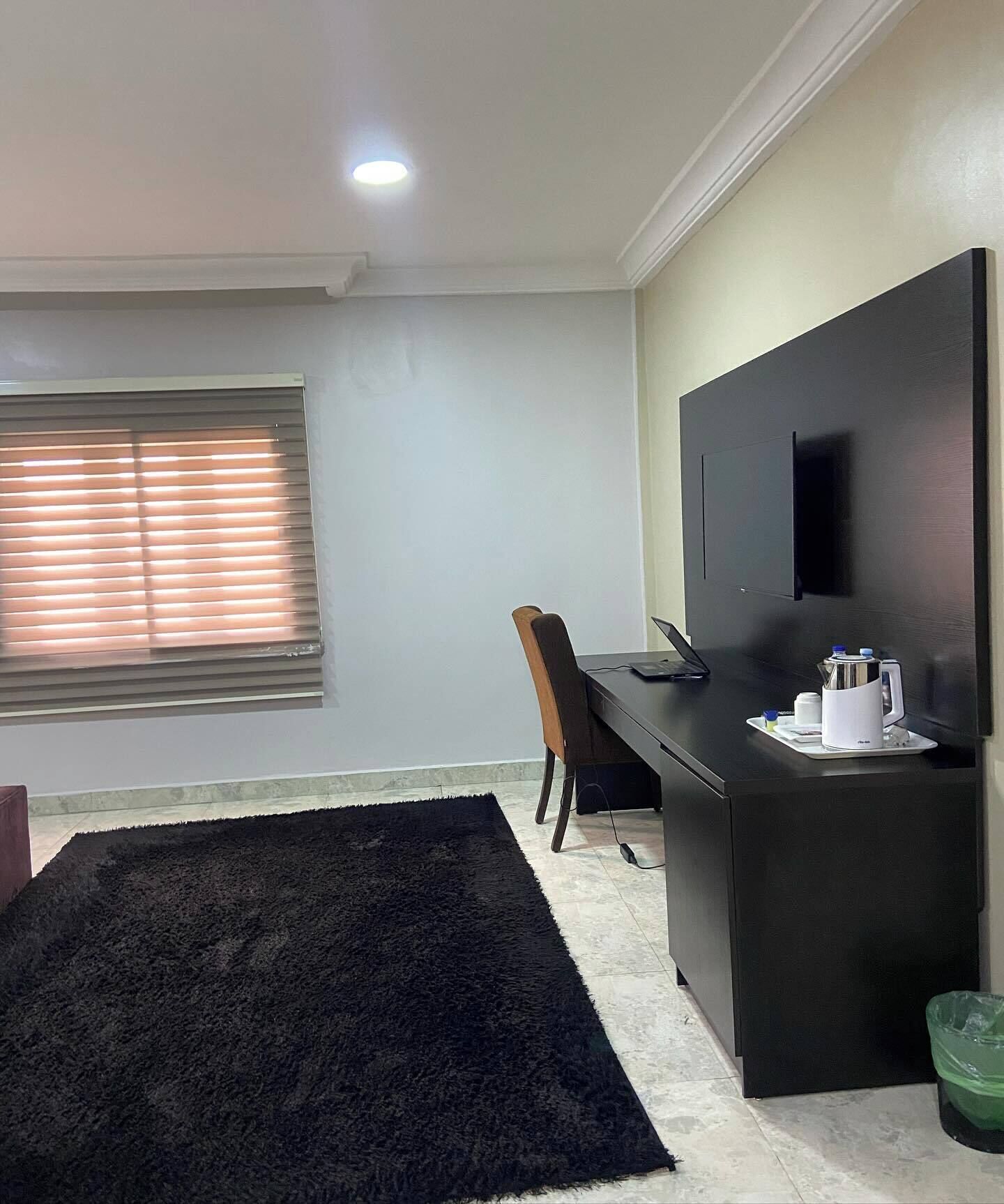 Deluxe Room, Balcony, City View | Desk, laptop workspace, blackout curtains, soundproofing