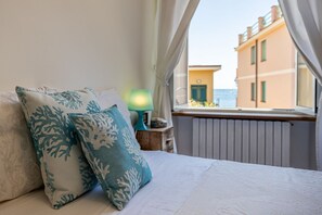 2 bedrooms, iron/ironing board, travel crib, internet