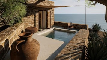 Luxe suite, uitzicht op zee | Een kluis op de kamer, verduisterende gordijnen, geluiddichte muren