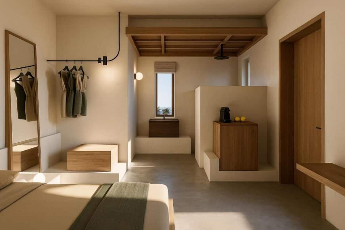 Ein modernes Schlafzimmer mit Bett, Kleiderschrank, Spiegel und Sitzbank.