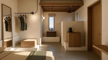 Deluxe suite, uitzicht op zee | Een kluis op de kamer, verduisterende gordijnen, geluiddichte muren