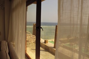 Appartement, Meerdere bedden | Uitzicht op strand/zee