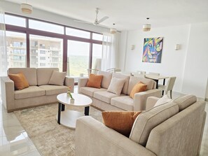 Executive Apartment, Multiple Beds | Living area | 55-inch Smart TV with digital channels - Tulip Residences Mombasa (Mtwapa)