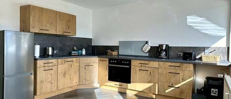 Réfrigérateur, four, plaque de cuisson, lave-vaisselle