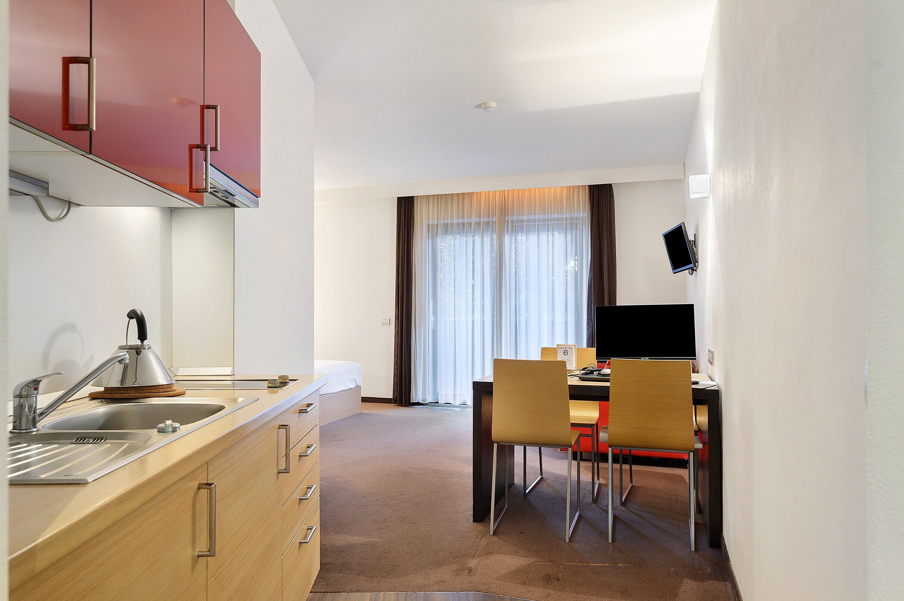 Fridge, microwave, stovetop, coffee/tea maker