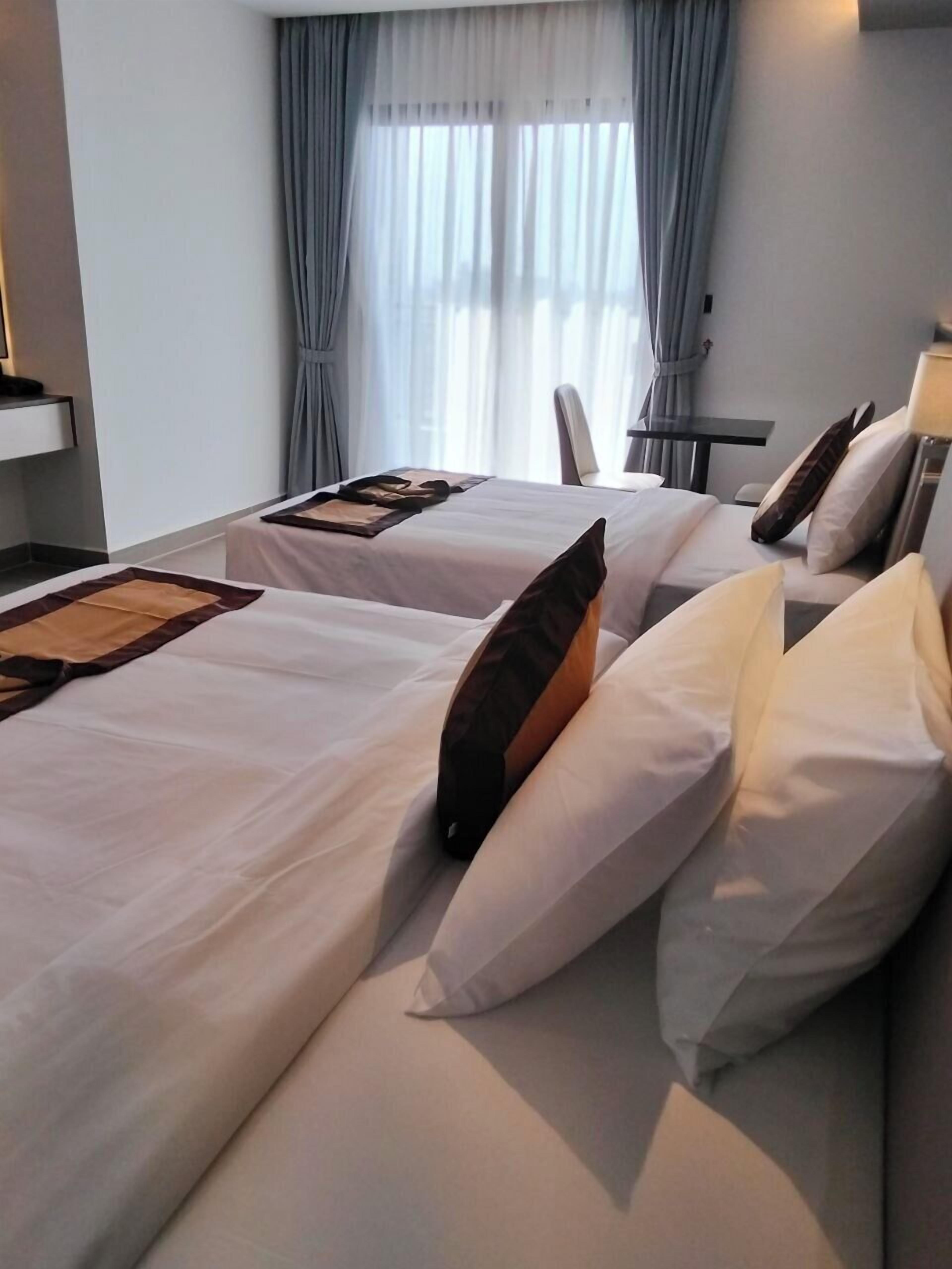 Family Room, Balcony, City View | Desk, laptop workspace, iron/ironing board, free WiFi