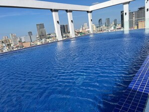 Outdoor pool, open 6:00 AM to 9:00 PM, pool umbrellas - LN HOTEL & RESIEDNECE  (Phnom Penh)