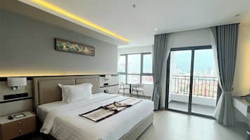 Habitación Deluxe | Escritorio y espacio para trabajar con un portátil