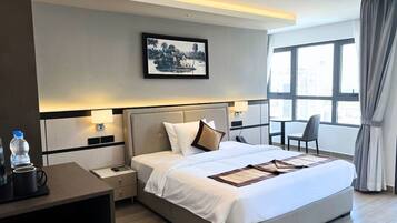 Chambre Deluxe | Bureau, espace de travail pour ordinateur portable