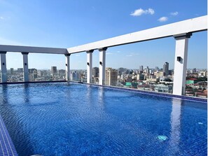 Outdoor pool, open 6:00 AM to 9:00 PM, pool umbrellas - LN Hotel & Residence  (Phnom Penh)
