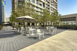 Outdoor dining - Celestial & Curated 1BR @ Downtown Dubai (Dubai)
