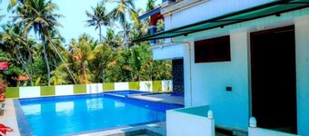 Ocean Queen Palace Poovar – Double Room with Refreshing Pool Views