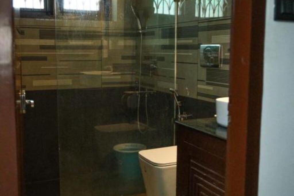 Shower, towels, soap, toilet paper