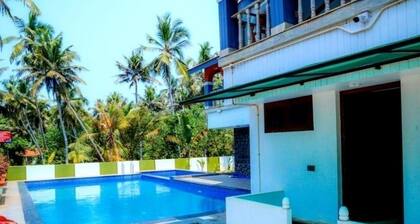 Ocean Queen Palace Poovar – Deluxe Double Room with Balcony Overlooking the Sea