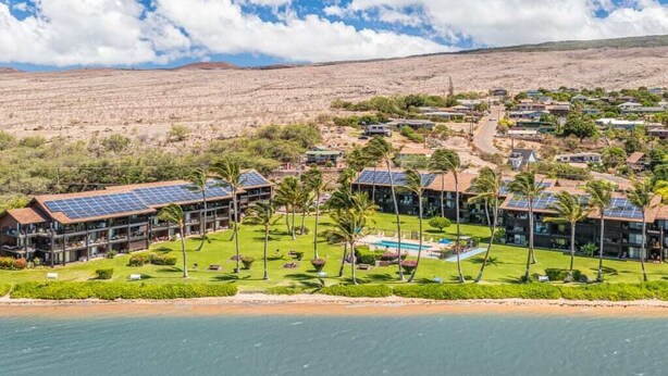 A resort with multiple buildings, a pool, and solar panels. - Ocean Views W/Ground Lanai and Kitchen-Molokai Shores (Kaunakakai)