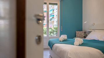 4 dormitorios, tabla de planchar con plancha, cuna de viaje y Internet