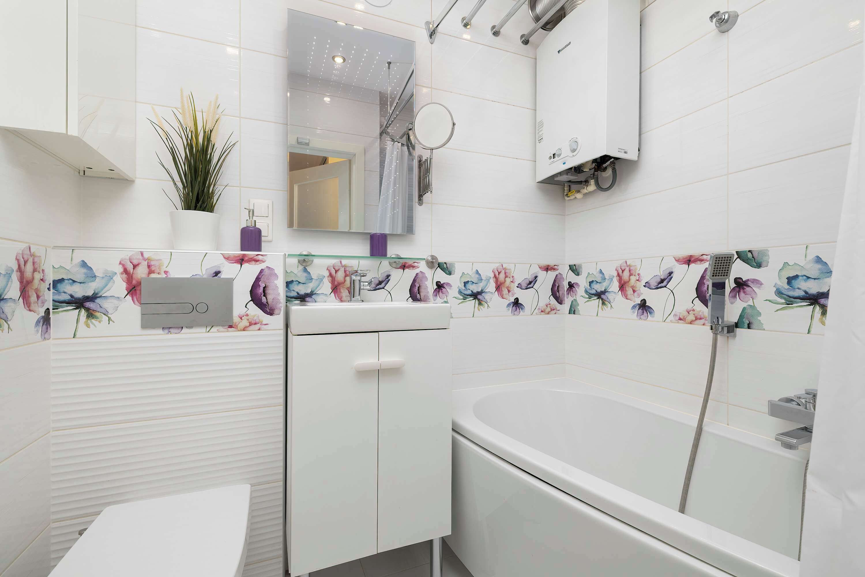 Shower, hair dryer, towels, shampoo