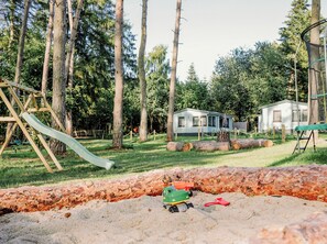 Children's area - Waldhaus 1 with whirlpool - Holiday homes island Usedom - Directly at the Achterwasser! (Lütow)