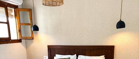 1 slaapkamer, een strijkplank/strijkijzer, wifi, beddengoed