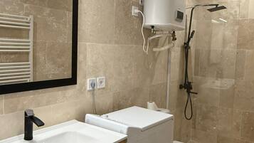 Dutxa, tovalloles i paper higiènic