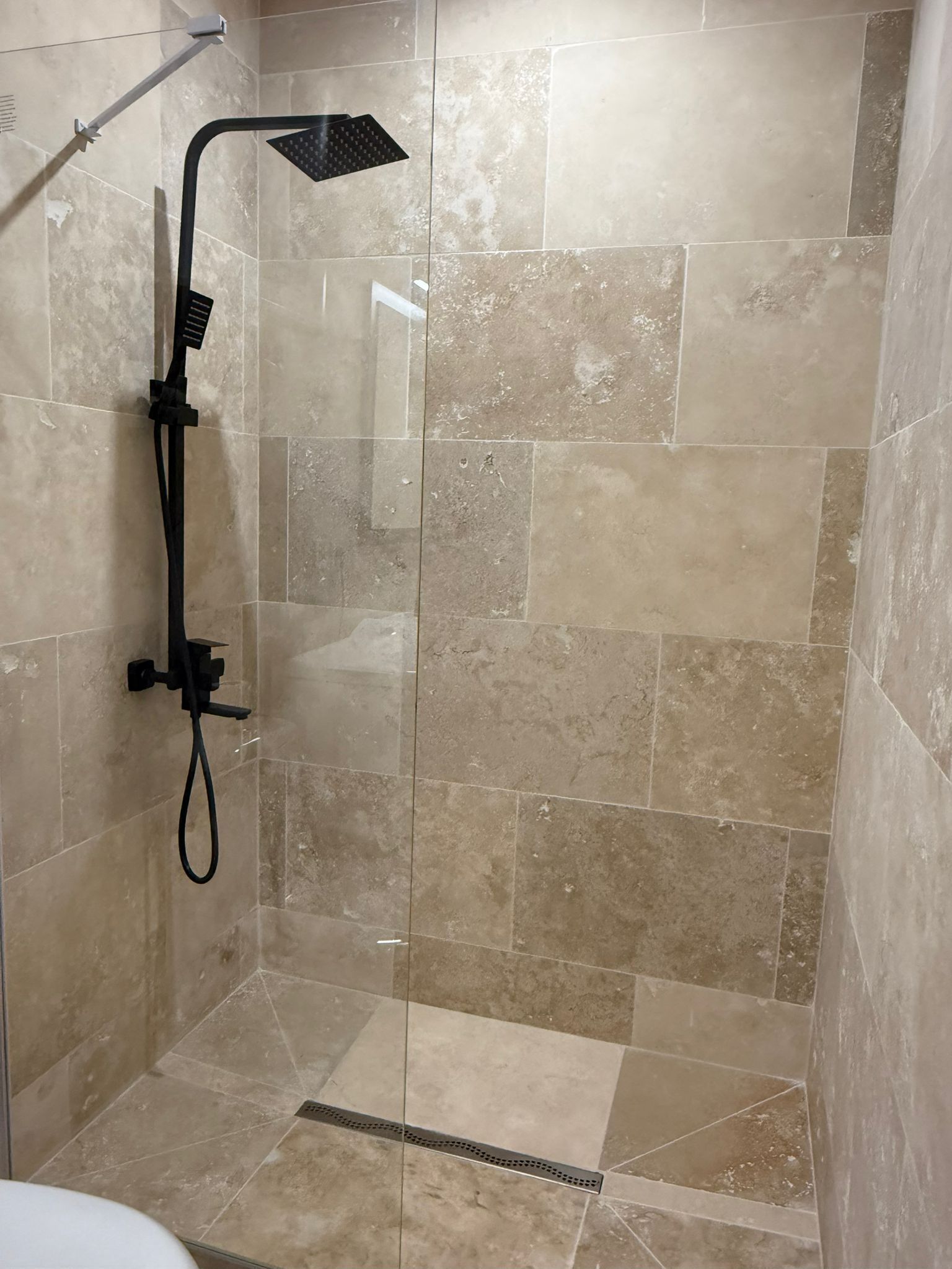 Shower, towels, toilet paper