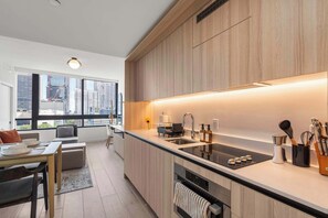 Fridge, microwave, oven, stovetop - 2BR · Walk to FIFA Fan Fest · Walkable Hub (Miami)