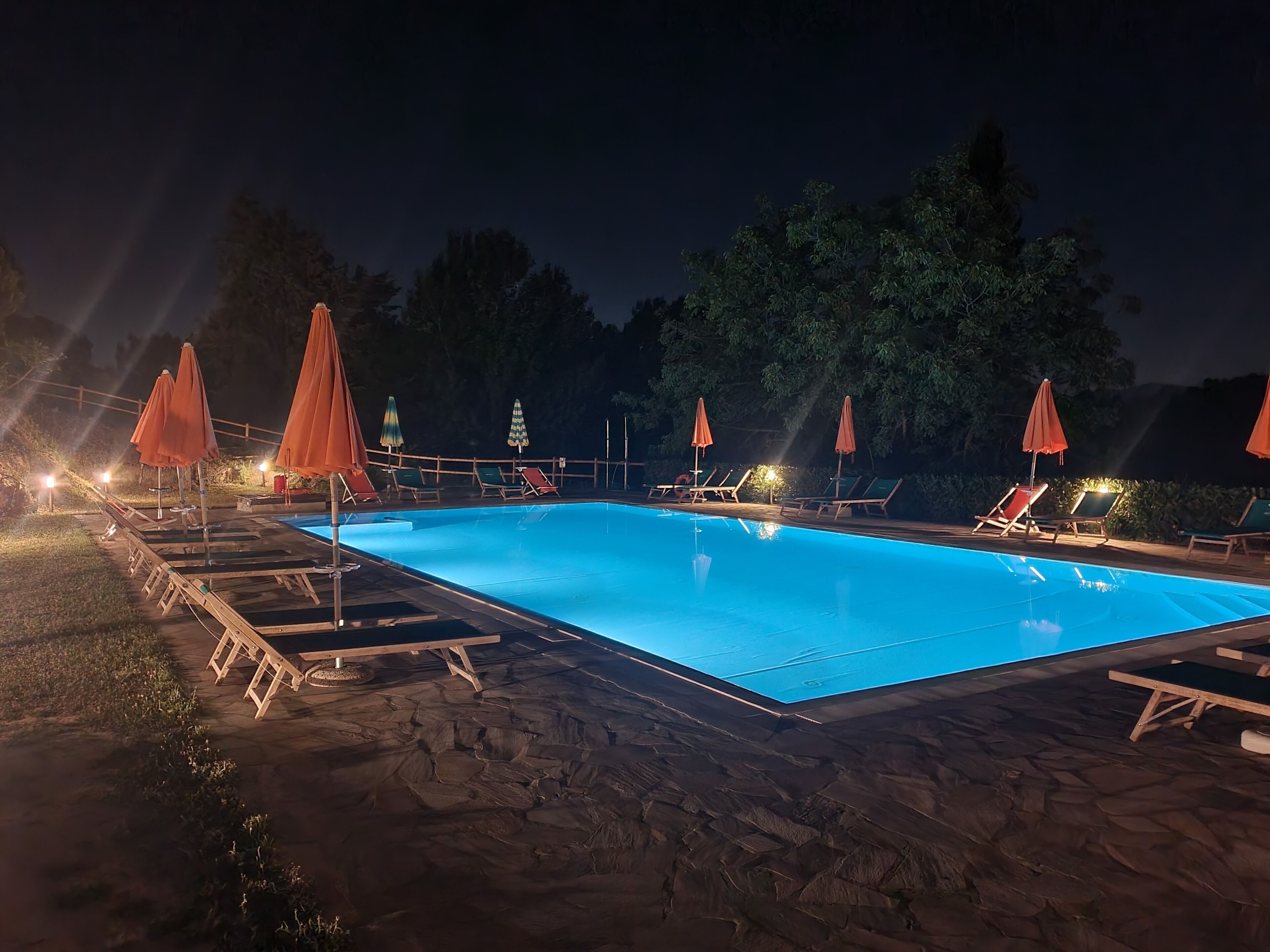 Seasonal outdoor pool, open 9:00 AM to 7:00 PM, pool umbrellas